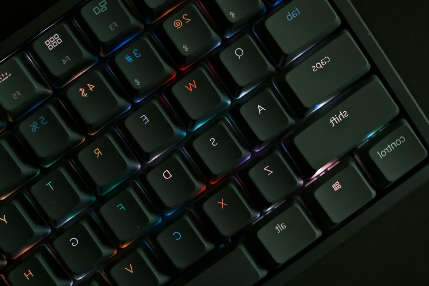 Students analyzing esports match footage during tactical training session